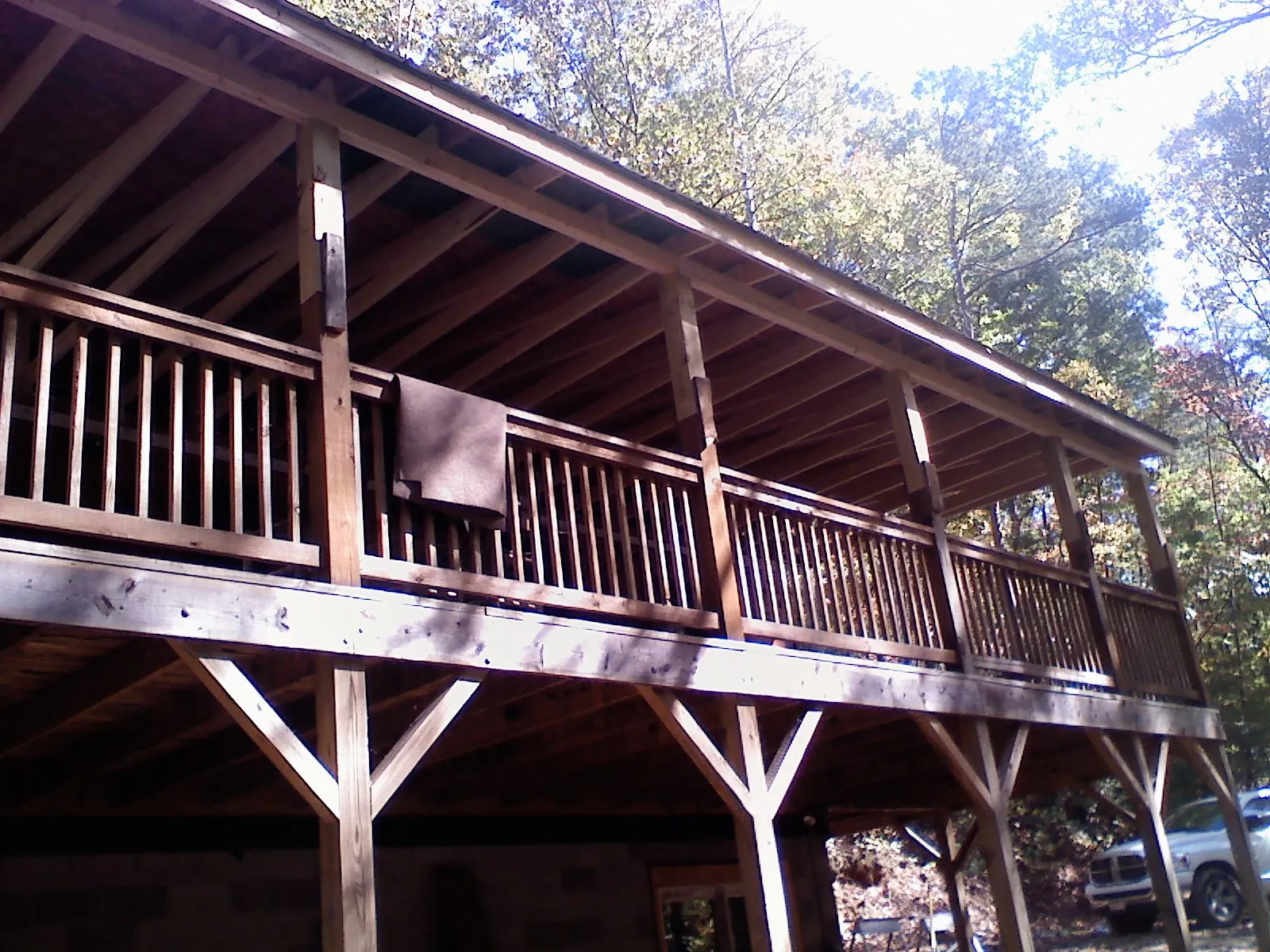 Timber framing under a new elevated porch and deck — Roof Leak Repair in Umatilla by Roofing Brothers